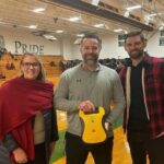 Microboard donates AED to Bassick HS with In A Heartbeat.